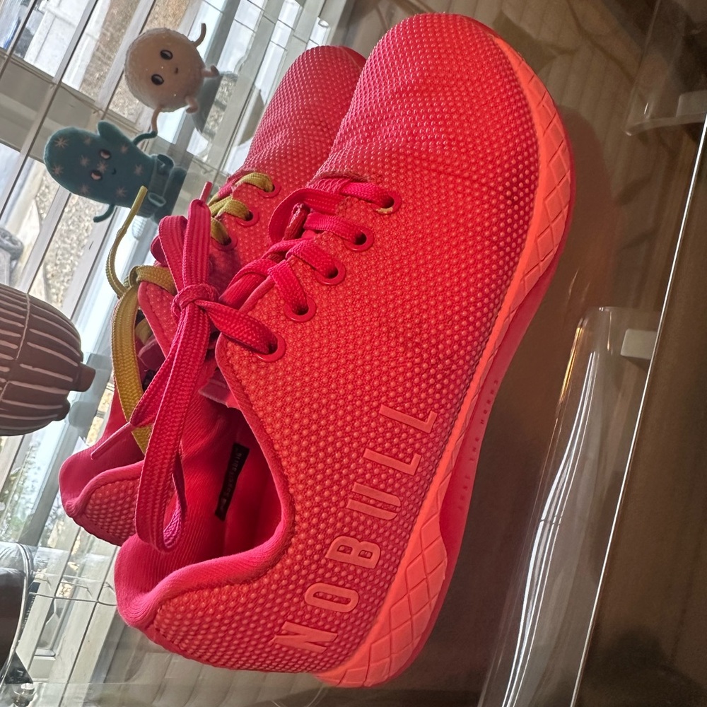 Gently used pink neon trainers